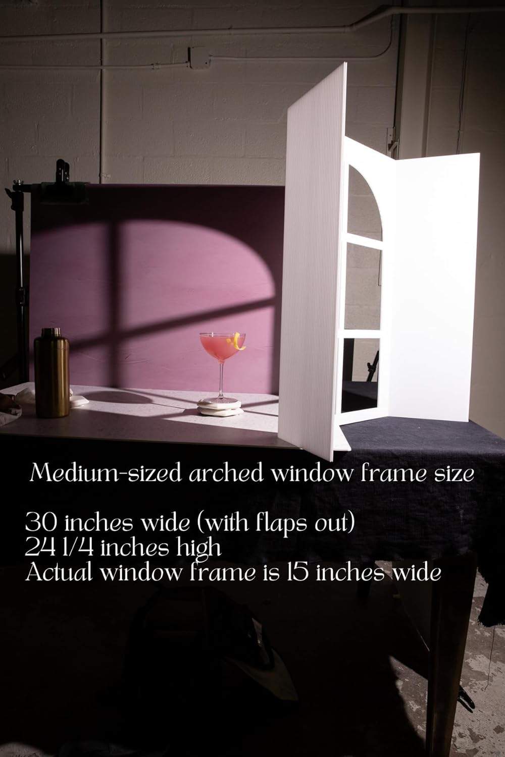 Add an elegant touch to your photography with the Bessie Bakes Backdrops Medium Size Faux Window Frame Collection. This 3-pack includes an Arched Window Frame, Traditional Window Frame, and Window Blinds, giving you the versatility to create unique shadow effects and natural light simulations for your shoots. These self-standing frames are lightweight and durable, offering a realistic window look without the need for a bulky set.

Each frame measures 15 inches x 24-1/4 inches with the flaps closed and expands to 30 inches wide when opened. Ideal for food, product, or lifestyle photography, these frames allow you to control your lighting setups for the perfect shot.

What’s Included:
 - Arched Window Frame
 - Traditional Window Frame
 - Window Blinds Frame

The frames are crafted from durable, lightweight materials and are easy to transport and set up, making them perfect for photographers and content creators looking for a portable and flexible solution.